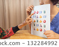 Asian Elderly Woman with Dementia Practicing match pictures. 132284992