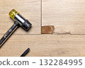 The Interlocking laminate floor is chip or crack due to scratches and impact. Repairing a damaged laminate floor concept. 132284995
