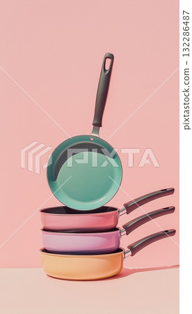 A stack frying pan cooking kitchenware at restaurant or home in vertical pink background 132286487