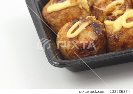 Hot takoyaki are served side by side Hot takoyaki are served side by side 132286874