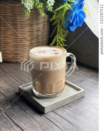 Hot Cappuccino in a Clear Glass Mug Hot Cappuccino in a Clear Glass Mug 132287511