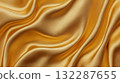 Luxurious golden silk fabric with smooth flowing texture 132287655