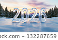 Glass 2026 sculpture in snowy landscape with sunrise and pine trees 132287659