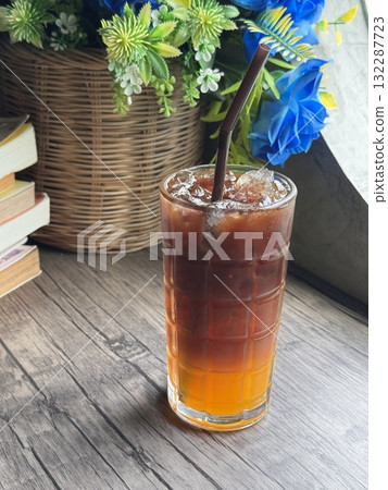 Refreshing Orange Americano Coffee with Citrus Twist	 132287723