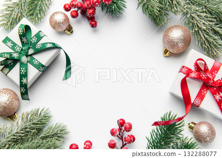 Christmas gifts and decorations forming a festive frame Christmas gifts and decorations forming a festive frame 132288077