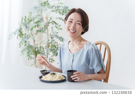 A woman eating Zaru Udon 132288638