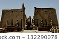 Telephoto shots of ancient temples and desert stone statues - distant views for tourism promotion 132290078