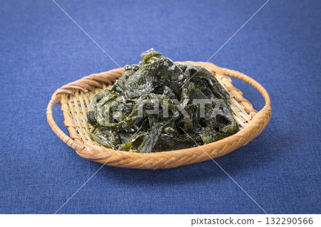 Salted wakame seaweed in a colander Salted wakame seaweed in a colander 132290566
