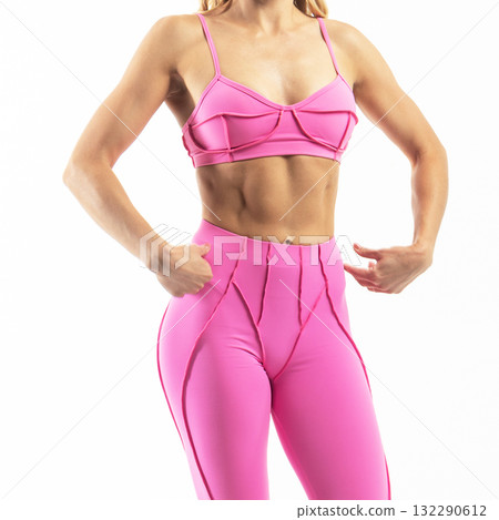 athletic female body in pink sportswear, fitness woman, athletic girl torso on white background 132290612