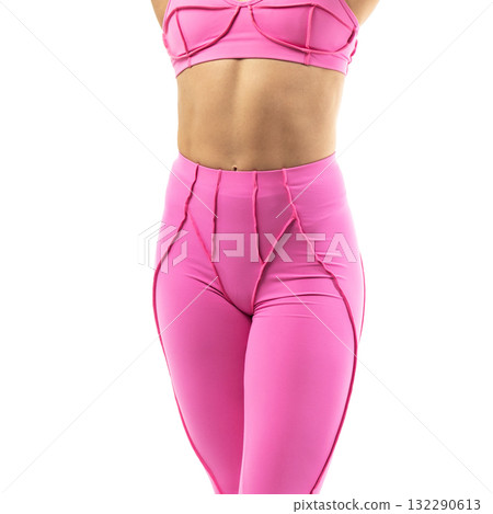 athletic female body in pink sportswear, fitness woman, athletic girl torso on white background athletic female body in pink sportswear, fitness woman, athletic girl torso on white background 132290613