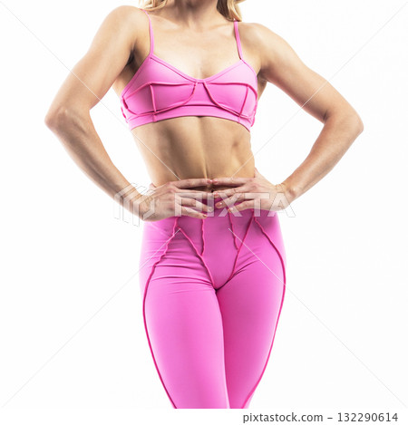 athletic female body in pink sportswear, fitness woman, athletic girl torso on white background 132290614
