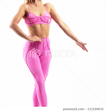 athletic female body in pink sportswear, fitness woman, athletic girl torso on white background 132290616