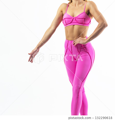 athletic female body in pink sportswear, fitness woman, athletic girl torso on white background 132290618