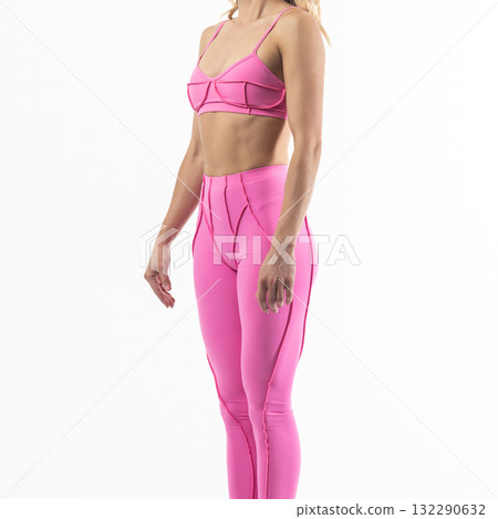 athletic female body in pink sportswear, fitness woman, athletic girl torso on white background 132290632