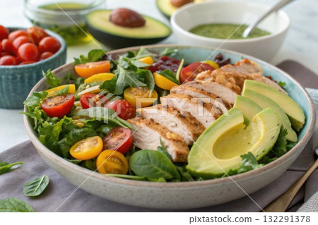 Closeup chicken salad with avocado on ceramic plate 132291378