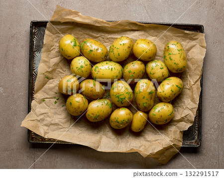boiled potatoes with oil and parsley boiled potatoes with oil and parsley 132291517