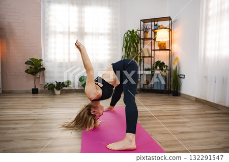 Embracing balance and serenity in a home yoga practice Embracing balance and serenity in a home yoga practice 132291547