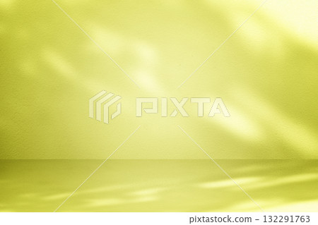 Stucco Table and Wall Background with Spotlight in Yellow Tone Stucco Table and Wall Background with Spotlight in Yellow Tone 132291763