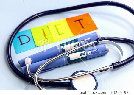 Ozempic pen for weight loss and diet abbreviation on multi-colored paper Ozempic pen for weight loss and diet abbreviation on multi-colored paper 132291923