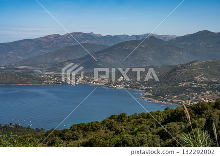 Spectacular view Golf at Sagone Corsica France beautyful sand Beach boats mountain village Tourism and vacations concept 132292002