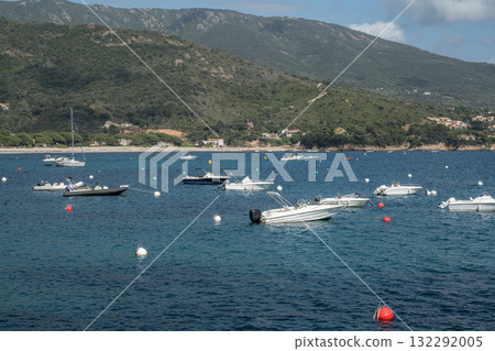 Spectacular view Golf at Sagone Corsica France beautyful sand Beach boats mountain village Tourism and vacations concept Spectacular view Golf at Sagone Corsica France beautyful sand Beach boats mountain village Tourism and vacations concept 132292005