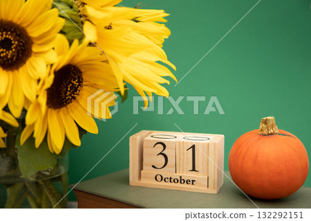 Halloween. Composition of sunflowers and pumpkins. Halloween Celebration on October 31 Halloween. Composition of sunflowers and pumpkins. Halloween Celebration on October 31 132292151