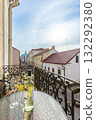 Sunny Balcony with Wine and European Street View 132292380