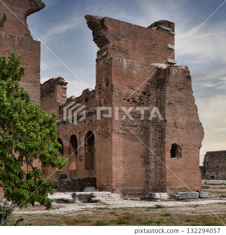 Red Basilica ruins, ancient Pergamon, Bergama, Turkey. Historic brick architecture under a cloudy sky. 132294057