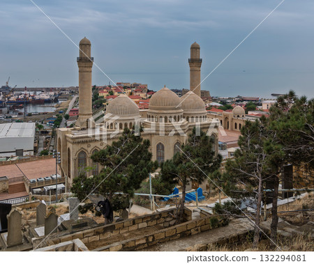 Historic Bibi-Heybat Mosque overlooking the Caspian Sea and port, Baku, Azerbaijan. Historic Bibi-Heybat Mosque overlooking the Caspian Sea and port, Baku, Azerbaijan. 132294081