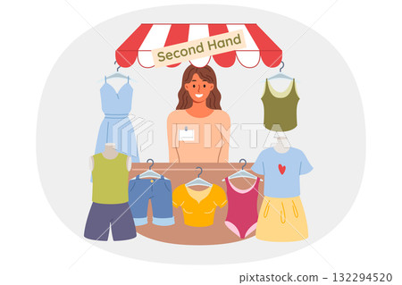 Woman selling second hand shop smiles and looks at screen, urging to buy cheap clothes Woman selling second hand shop smiles and looks at screen, urging to buy cheap clothes 132294520