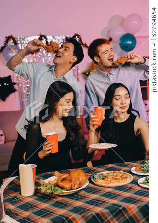 Diversity, dinner and group of people toast celebration together at party. Friends, happy and celebrate with food, wine and friendship for love, support and cheers champagne at business function Diversity, dinner and group of people toast celebration together at party. Friends, happy and celebrate with food, wine and friendship for love, support and cheers champagne at business function 132294654