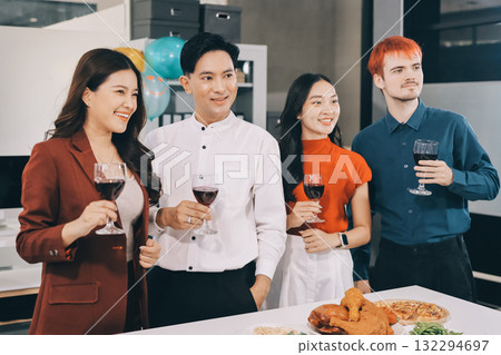 Diversity, dinner and group of people toast celebration together at party. Friends, happy and celebrate with food, wine and friendship for love, support and cheers champagne at business function 132294697
