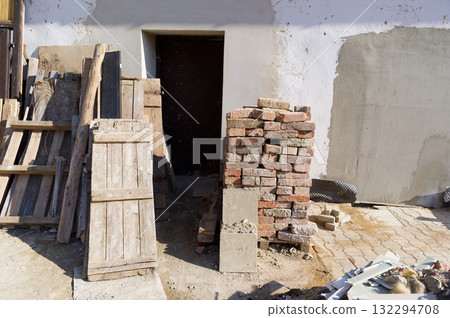 View of a construction waste dump. This waste was generated during the reconstruction of an old house. 132294708