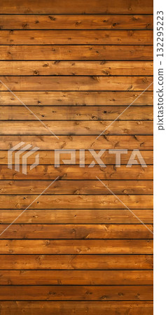 Background image of a brown vertical wooden fence with grain 132295223