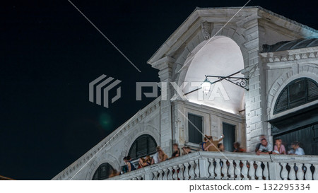 Rialto Bridge or Ponte di Rialto over Grand Canal timelapse at night in Venice, Italy. 132295334