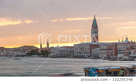 View of the Doge's Palace and the Campanile of St. Mark's Cathedral at sunset timelapse. Venice, Italy 132295346