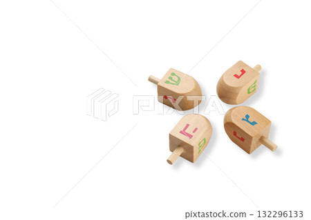 Four colorful dreidels on a white background, isolated, PNG 132296133