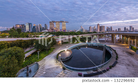 Panorama of Singapore with Gardens by the bay night to day timelapse before sunrise 132296692