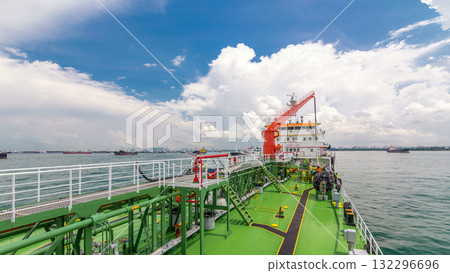 Green deck of the tanker under blue sky timelapse 132296696