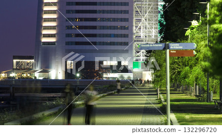 Walkway near Hotel Tower in the Park of the Nations timelapse from day to night Walkway near Hotel Tower in the Park of the Nations timelapse from day to night 132296720