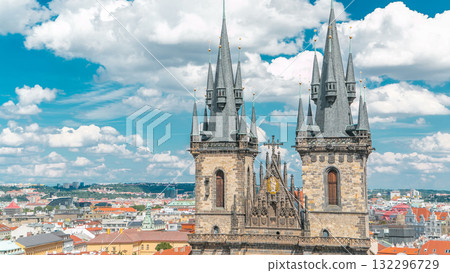 Church of our lady before Tyn timelapse in Prague, Czech republic. Gothic church in Prague Old town with beautiful cloudy sky. Church of our lady before Tyn timelapse in Prague, Czech republic. Gothic church in Prague Old town with beautiful cloudy sky. 132296729