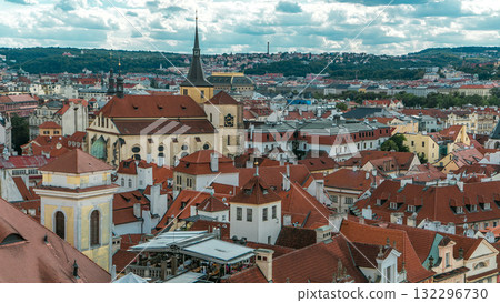 Aerial timelapse view of the traditional red roofs of the city of Prague, Czech Republic with the church of St. Jilji Aerial timelapse view of the traditional red roofs of the city of Prague, Czech Republic with the church of St. Jilji 132296730