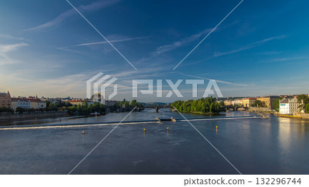 Vltava river timelapse hyperlapse in district Strelecky ostrov with the bridge of the Legions and National Theater building, Prague, Czech Republic 132296744