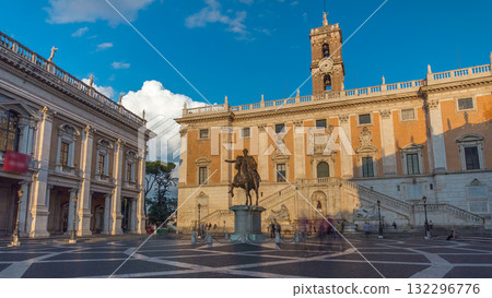 Capitoline hill landmark square timelapse hyperlapse surrounded by neo classic museums buildings with clock tower and bronze statue of Mark Aurelius 132296776