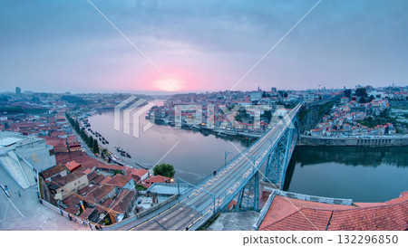 Day to night view of the historic city of Porto, Portugal timelapse with the Dom Luiz bridge 132296850