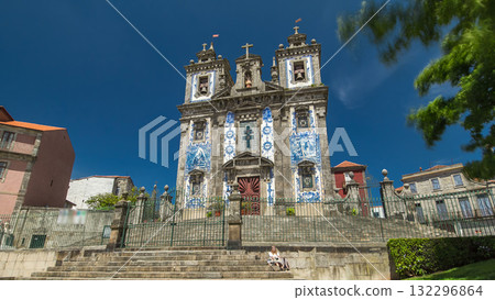 Church of Saint Ildefonso timelapse hyperlapse, covered with typical Portuguese tiles called Azulejos in Porto, Portugal. 132296864