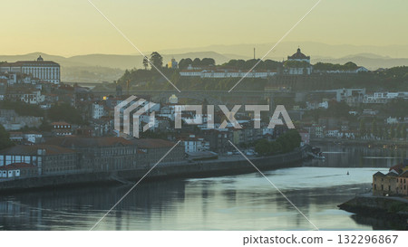 Aerial morning view after sunrise at the most emblematic area of Douro river timelapse. Porto Aerial morning view after sunrise at the most emblematic area of Douro river timelapse. Porto 132296867