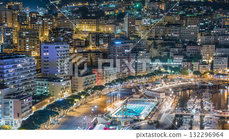 Seaside swimming pool in Monaco night timelapse, buildings in the background. Seaside swimming pool in Monaco night timelapse, buildings in the background. 132296964