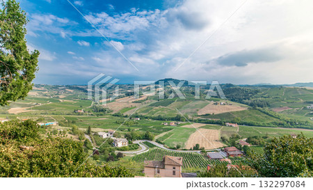 view of green summer valley of italian countryside timelapse with hills on background view of green summer valley of italian countryside timelapse with hills on background 132297084