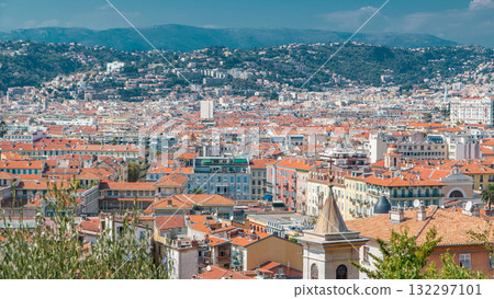 Bright sun lights red roofs of the old city timelapse. Aerial view from Shatto's hill. Nice, France 132297101